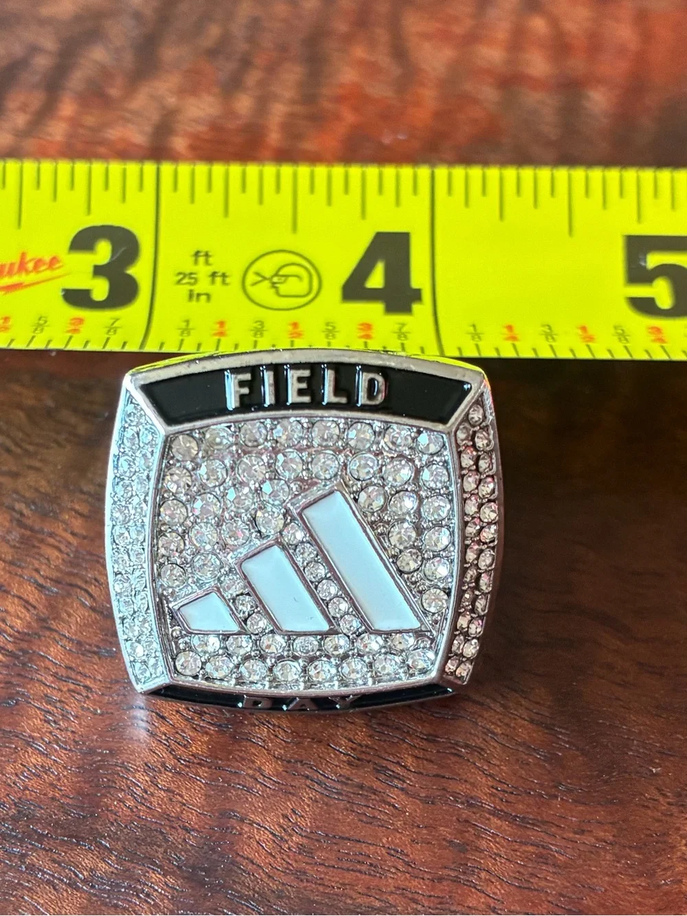 adidas Silver Tone Crystal Logo Ring with White Enamel Accents